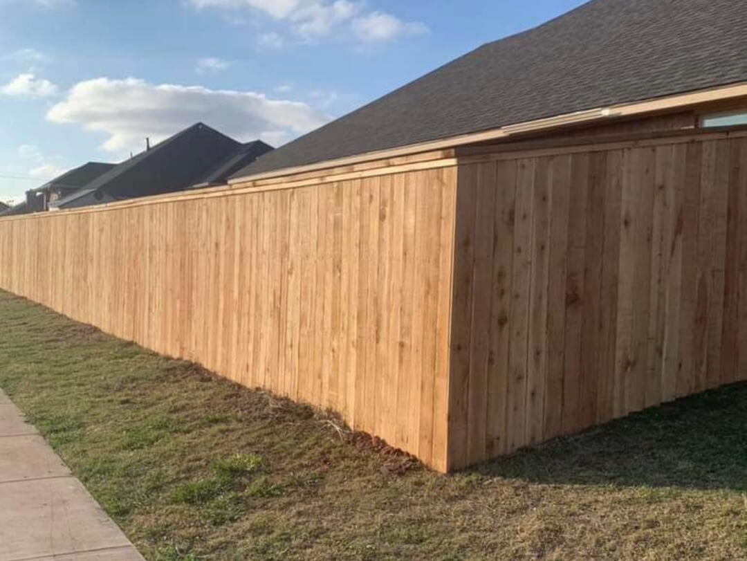 Wooden fence installation by KB Fence & Construction